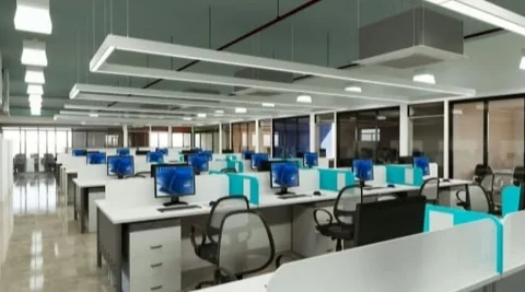 Office floor lit with suspended linear LED fixtures