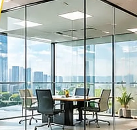 Glass-walled conference room with switchable smart glass partitions